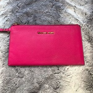 Pink and gold Michael Khors wristlet